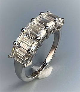 Stunning 5.07 Ct VVs1 F-G Fire Moissanite Ring: These 5 Emerald Cut Moissanites are VVs1 Clarity and F-G in color measuring approx. 6.5 x 4.5 mm. These investment grade Moissanites are near flawless and bursting out with a full spectrum of colors.