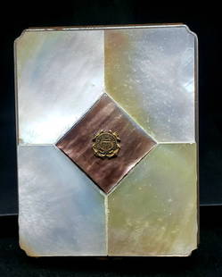 Rare Vintage US Coast Guard Vintage Makeup Compact: This vintage antique is designed with pearlescent inlayed abalogne and US Coast Guard 1790 Insignia. Comes with original powder puff and unbroken mirror.