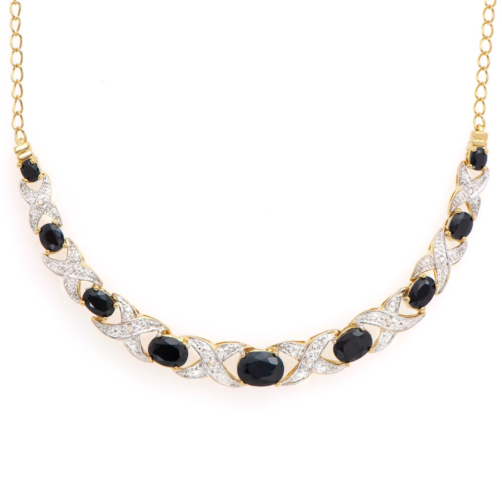 Plated 18KT Yellow Gold 6.18ctw Black Sapphire and Diamond Pendant with Chain: One Plated 18KT Yellow Gold 6.18ctw Black Sapphire and Diamond Pendant with Chain. (9) black sapphires with a total weight of 6.18cts. Diamonds with a total weight of 0.06cts. Total weight of this pen
