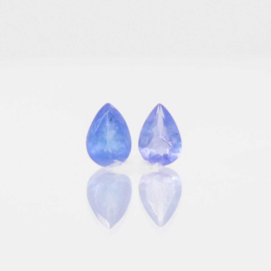 Matching Pair Natural Violet Blue Tanzanite's: Matching Pair Natural Violet Blue Tanzanite's. Eye clean faceted pair cuts weighing 1.32 cttw. Perfect pair for earrings.