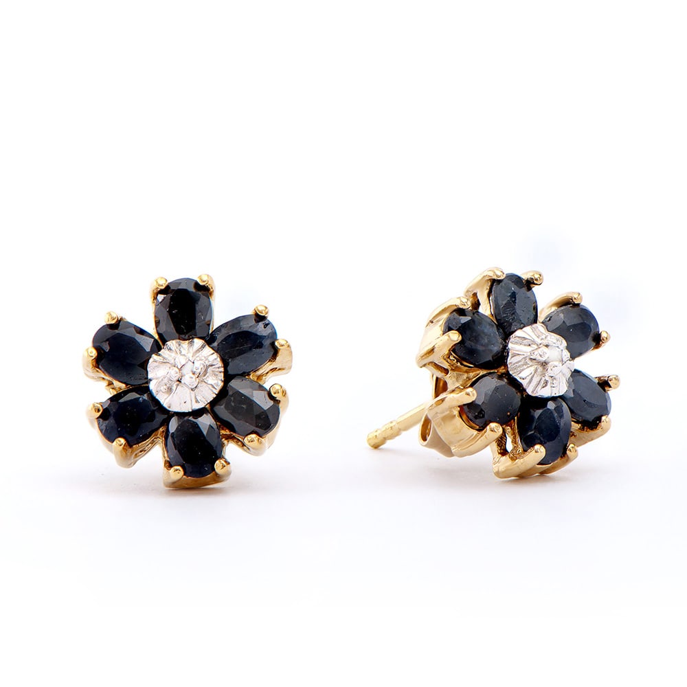 Plated 18KT Yellow Gold 3.05ctw Black Sapphire and Diamond Earrings: One pair of Plated 18KT Yellow Gold 3.05ctw Black Sapphire and Diamond Earrings. (12) Black Sapphires with a total weight of 3.05cts. Diamonds with a total weight of 0.02cts with a color of I-J and wi