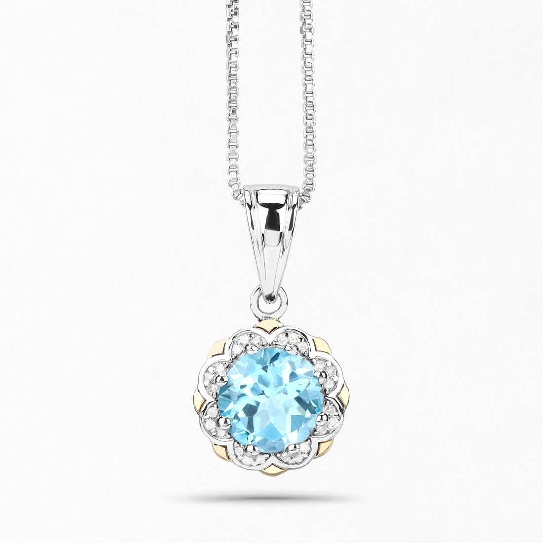 Plated Rhodium 2.25ct Blue Topaz and Diamond Pendant with Chain: 2.32 Carat Genuine Swiss Blue Topaz and White Diamond 14K Yellow Gold with.925 Sterling Silver Pendant. Swiss Blue Topaz Round/8.00mm - 1/2.25 ctw Prong Setting Natural Irradiated E + White Diamond Ro