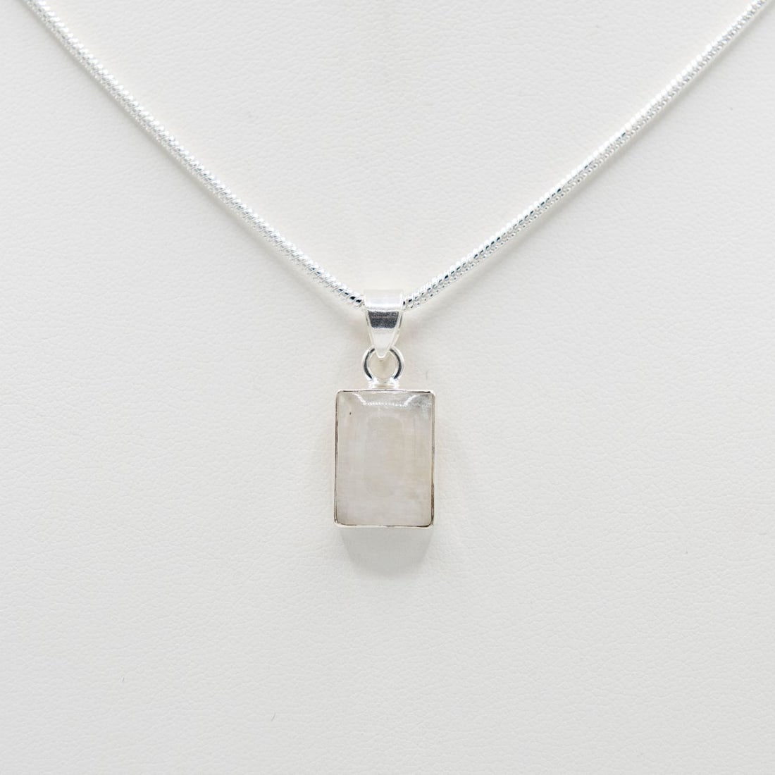 Pretty Luminescent 7.5 Ct Natural Moonstone Pendant: Rare Emerald Cabochon Cut Moonstone That Shows Multiple Colors And A Vivid Hue. Mounted In Solid .925 Stamped Sterling Silver. Includes 20 "Chain.11.4 Total Gram Wt. Or 57 Ctttw.
