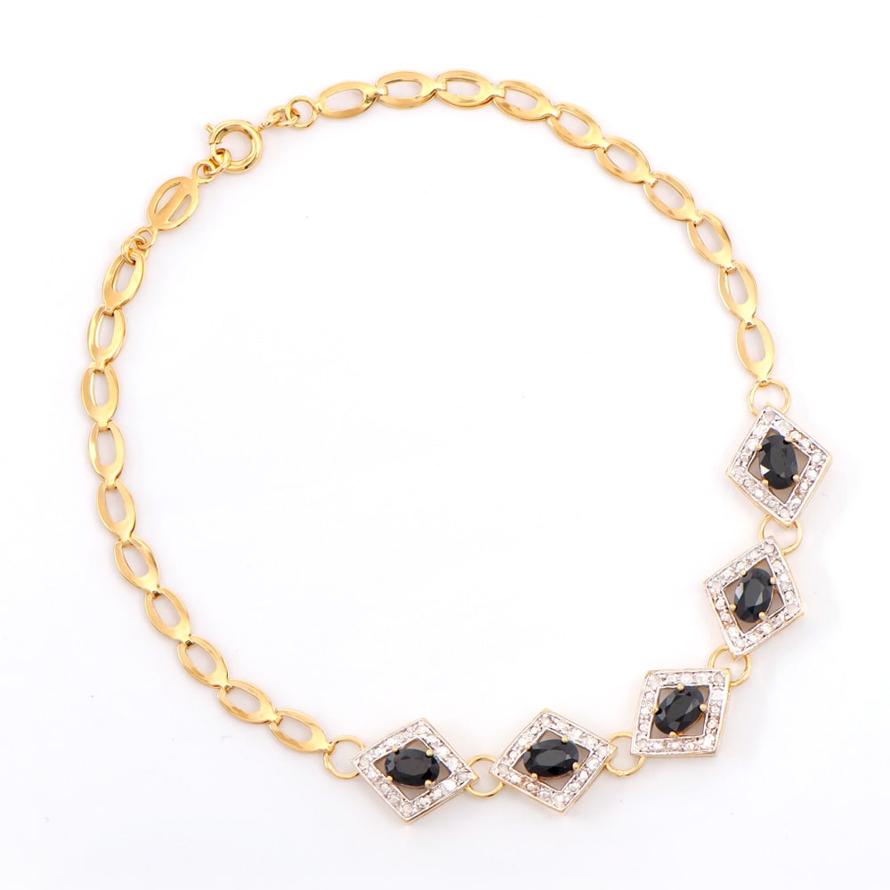Plated 18KT Yellow Gold 3.45ctw Black Sapphire and Diamond Bracelet: One Plated 18KT Yellow Gold 3.45ctw Black Sapphire and Diamond Bracelet. 5 pieces of 6x4mm Black Sapphires. 20 pieces of 1.1mm round diamonds with I-3 clarity and I-J color with a total weight of 0.16