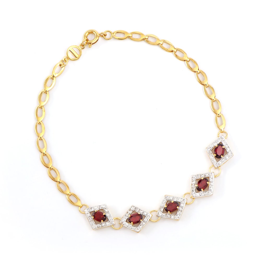 Plated 18KT Yellow Gold 2.25ctw Garnet and Diamond Bracelet: One Plated 18KT Yellow Gold 2.25ctw Garnet and Diamond Bracelet. (5) Garnet stones with a total weight of 2.25cts. Diamonds with a total weight of 0.15cts with a color of I-J and clarity of I-3. Total
