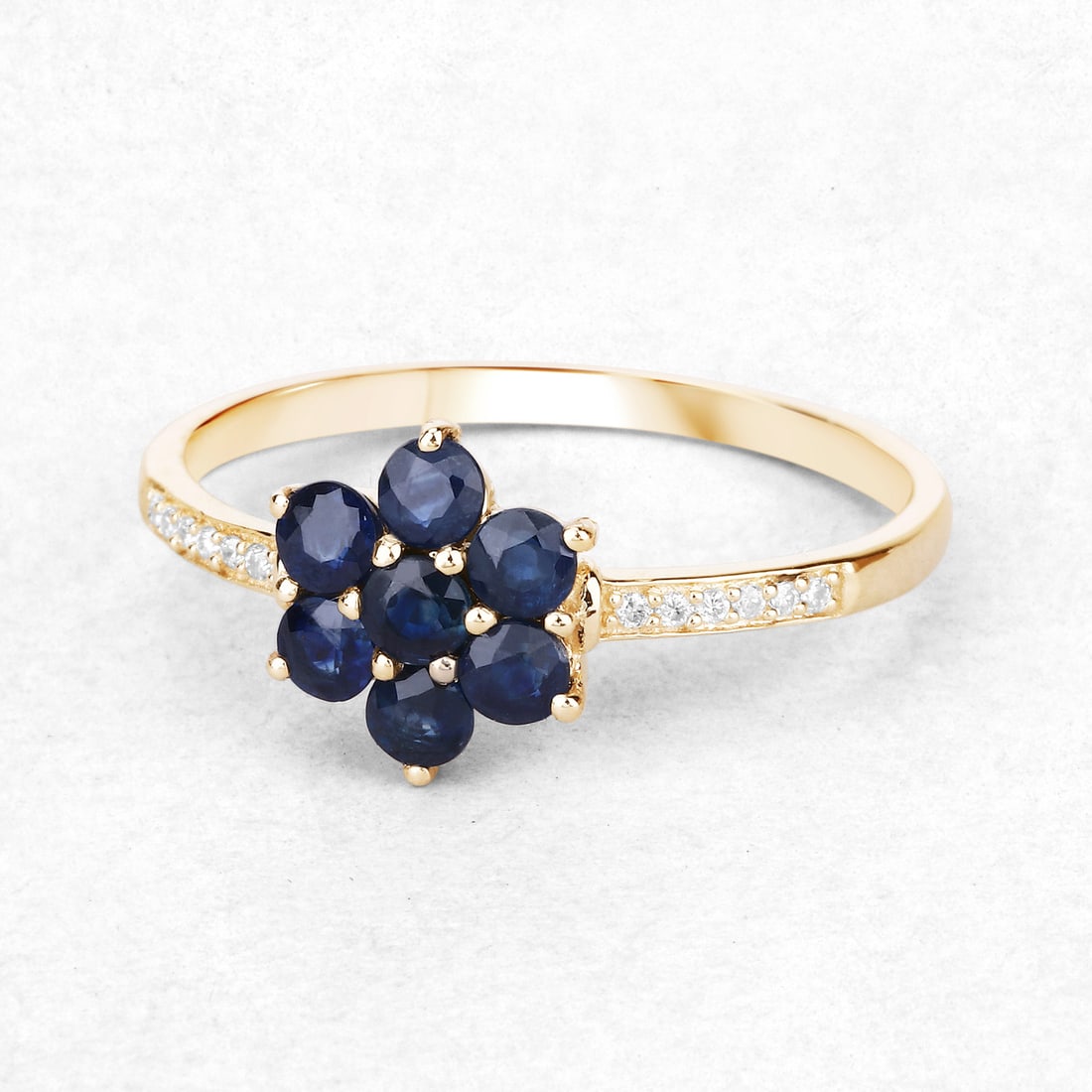 10KT Yellow Gold 0.45ctw Blue Sapphire and White Diamond Ring: Blue Sapphire Round/2.50mm - 7/0.42 ctw Prong Setting Natural Heat Treated E + White Diamond Round/0.80mm - 12/0.03 ctw Natural Not Treated N. Ring size 7. Total weight of 1.31 grams.