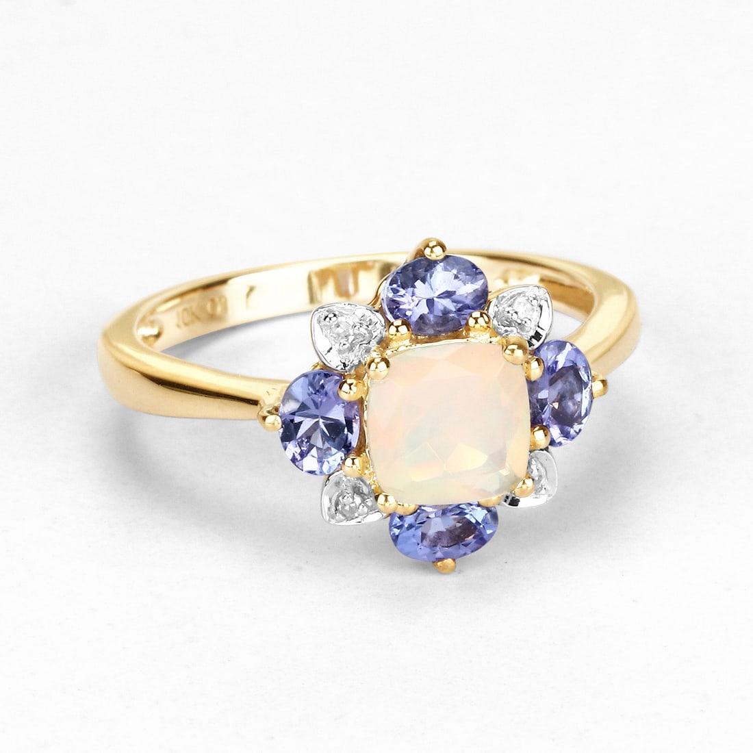 10KT Yellow Gold 1.20ctw Ethiopian Opal Tanzanite and White Diamond Ring: Ethiopian Opal Cushion/6.00mm - 1/0.50 ctw Prong Setting Natural Not Treated N + Tanzanite Oval/4x3mm - 4/0.68 ctw Natural Heat Treated E + White Diamond Round/1.00mm - 4/0.02 ctw Natural Not Treated