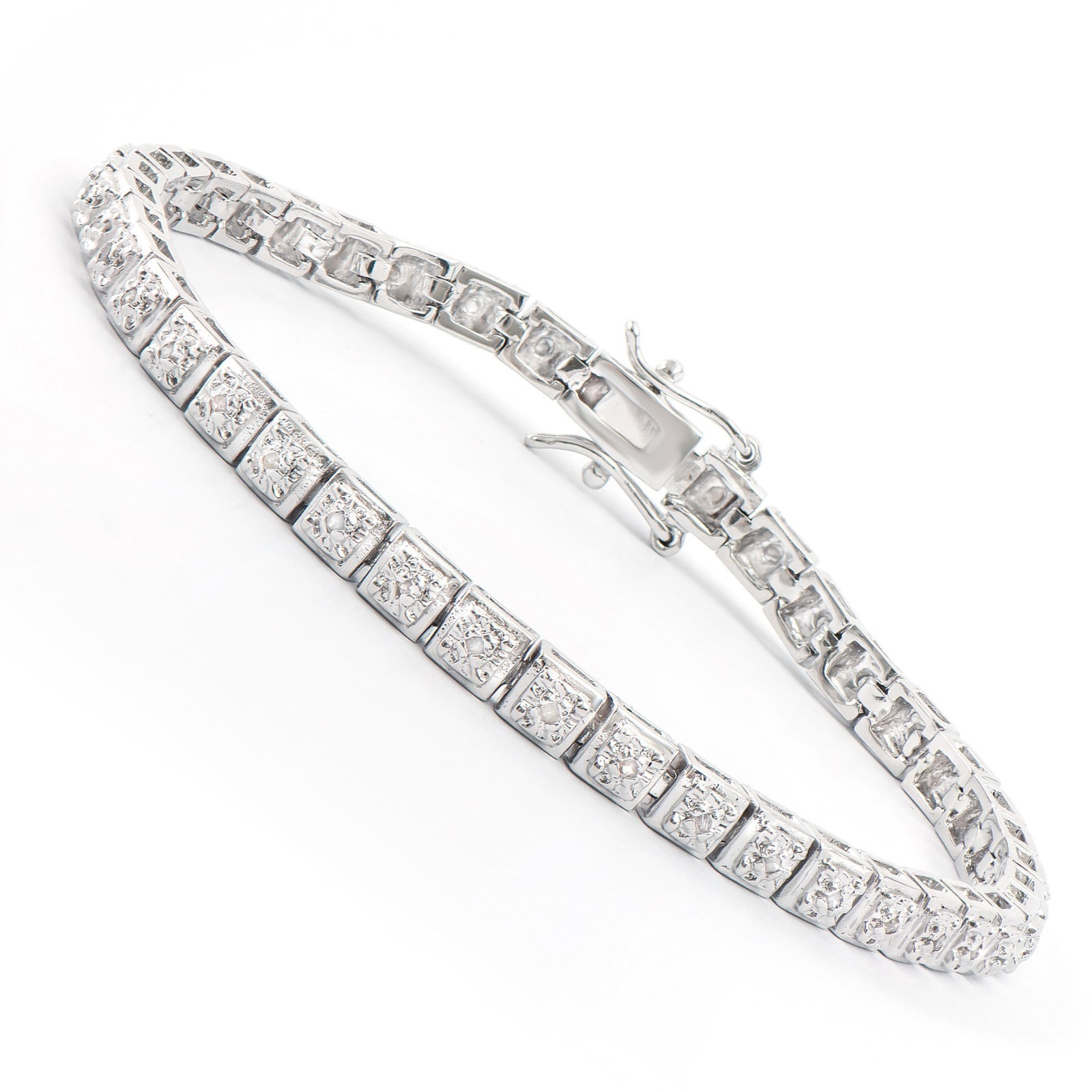 Plated Rhodium 0.32ctw Diamond Bracelet: One Plated Rhodium 0.32ctw Diamond Bracelet. (41) single cut round Diamonds with a color of I-J and clarity of I-3 measuring 1.1mm. 10.55 grams of brass layered with Rhodium. The length of this bracel