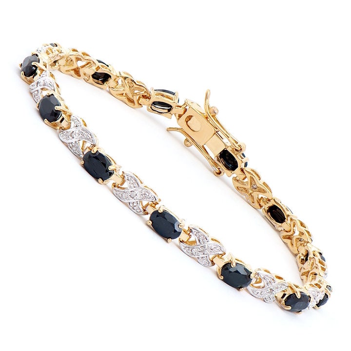 Plated 18KT Yellow Gold 8.25ctw Black Sapphire and Diamond Bracelet: One Plated 18KT Yellow Gold 8.25ctw Black Sapphire and Diamond Bracelet. (13) Black Sapphire stones with a total weight of 8.25cts. (13) Diamonds with a total weight of 0.11cts with a color of H-I and