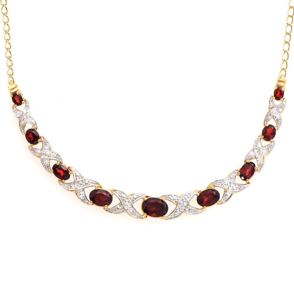 Plated 18KT Yellow Gold 4.86ctw Garnet and Diamond Pendant with Chain: One Plated 18KT Yellow Gold 4.86ctw Garnet and Diamond Pendant with Chain. (9) Garnet stones with a total weight of 4.86cts. Diamonds with a total weight of 0.06cts with a color of I-J and clarity of 