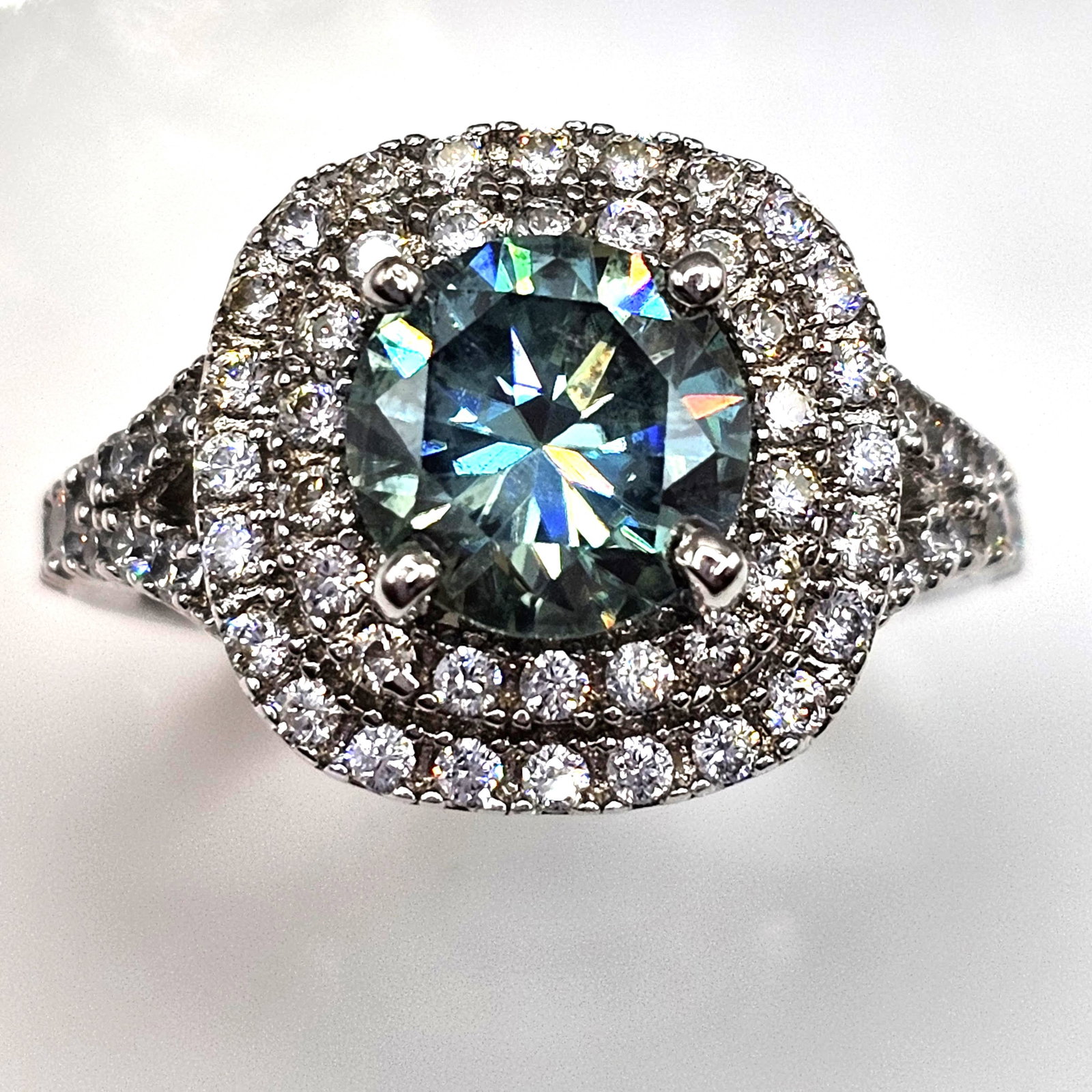Sparkling Rare 3.15ct VVs1 Fire Moissanite Ring: Sparkling Rare 3.15 Ct Ice Blue Fire Moissanite Ring. This Rare Large 3.15 Ct Investment Grade Center-stone is a VVs1 Brilliant 8 mm. Round Cut. The Color is Ice Blue and is near flawless bursting out