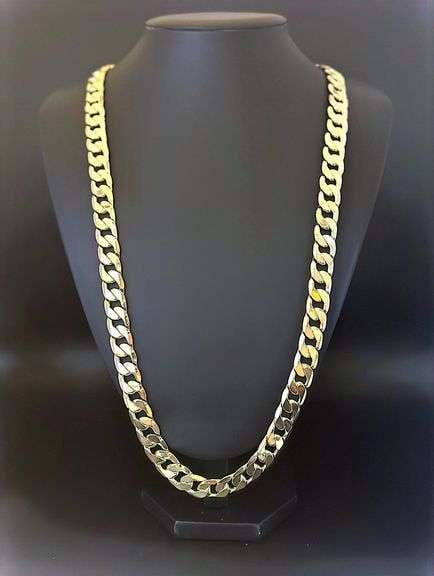 Huge 133.5 Gram 14 Kt Tri-Layered Gold Plate Cuban Link Necklace: Strong and durable heavy Tri-Layered 14 Kt Yellow Gold Plate Curb Link Necklace weighing 133.5 G rams. 30" in length 12 mm. wide. This High Quality Top Notch Bracelet Looks Like Solid Gold Without The