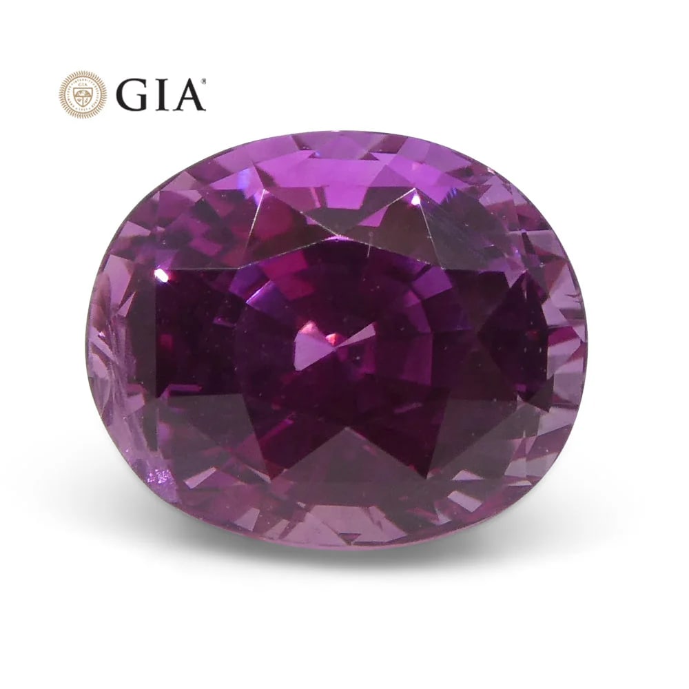 Rare 1.85 Ct GIA Certified Natural Sapphire: Impressive 1.85 Ct Pink Sapphire measuring 7.08 x 5.89 x 5.27 mm with a brilliant oval cut. Its medium dark tone and vivid pink hue would make a stunning piece to add to any collection. Origin: Madaga