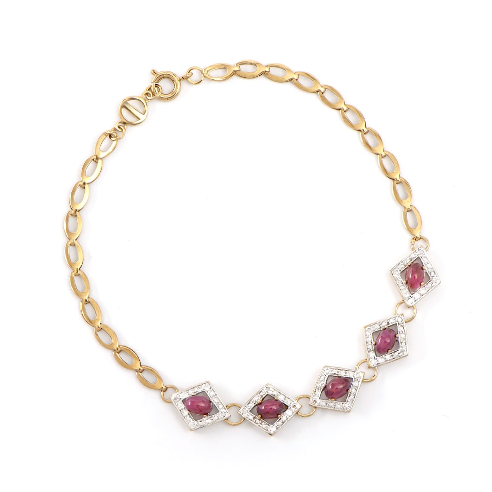 Plated 18KT Yellow Gold 3.25ctw Ruby and Diamond Bracelet: One Plated 18KT Yellow Gold 3.25ctw Ruby and Diamond Bracelet. (5) Rubies with a total weight of 3.25cts. Diamonds with a total weight of 0.15cts with a color of I-J and clarity of I-3. Total weight o