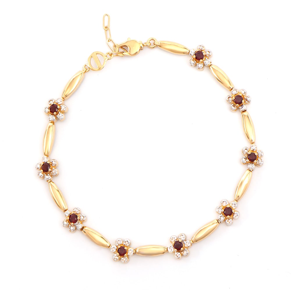 Plated 18KT Yellow Gold 0.92ctw Garnet and Diamond Bracelet: One Plated 18KT Yellow Gold 0.92ctw Garnet and Diamond Bracelet. (9) Garnet stones with a total weight of 0.92cts. Diamonds with a total weight of 0.13cts with a color of I-J and clarity of I-3. Total