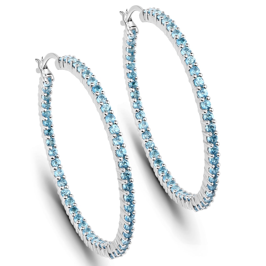 Plated Rhodium 3.60ctw Blue Topaz Earrings: 3.60 Carat Genuine Swiss Blue Topaz .925 Sterling Silver Earrings. Swiss Blue Topaz Round/2.00mm - 100/3.60 ctw Prong Setting Natural Irradiated E. Total weight of these earrings are 10.42 grams. Leng