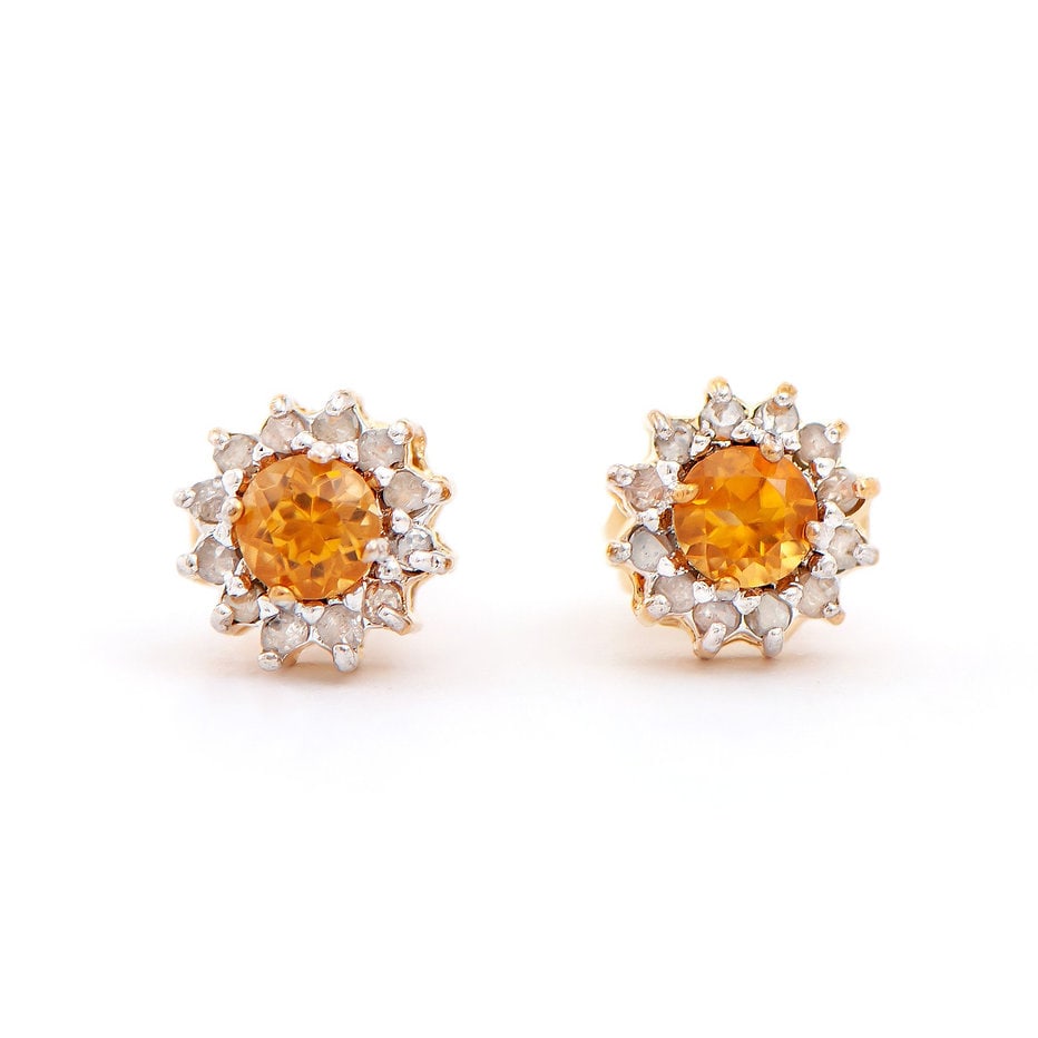 Plated 18KT Yellow Gold 0.40ctw Citrine and Diamond Earrings: One pair of Plated 18KT Yellow Gold 0.40ctw Citrine and Diamond Earrings. (2) Citrine stones with a total weight of 0.40cts. (24) diamonds with a total of 0.22cts with a color of H-I and clarity of I-