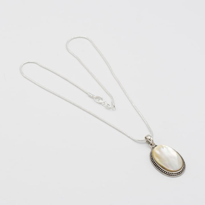 Luminescent 28.50ct Moonstone Pendant with Chain: Fine emerald cabochon cut mounted in solid .925 sterling silver. Pendant includes and 20" 2mm chain. Vivid luster and polish. 89 CTTW or 17.8 total gram wt.