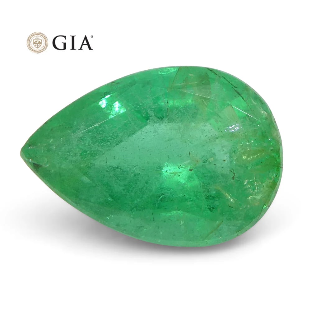 Impressive 1.64 Ct GIA Certified Natural Emerald: Stunning 1.64 Ct Green Emerald measuring 9.56 x 6.63 x 4.72 mm with a brilliant pear cut. This gem would make a fine centerpiece with its vivid hue! Origin: Russia. Please see the certification for ad