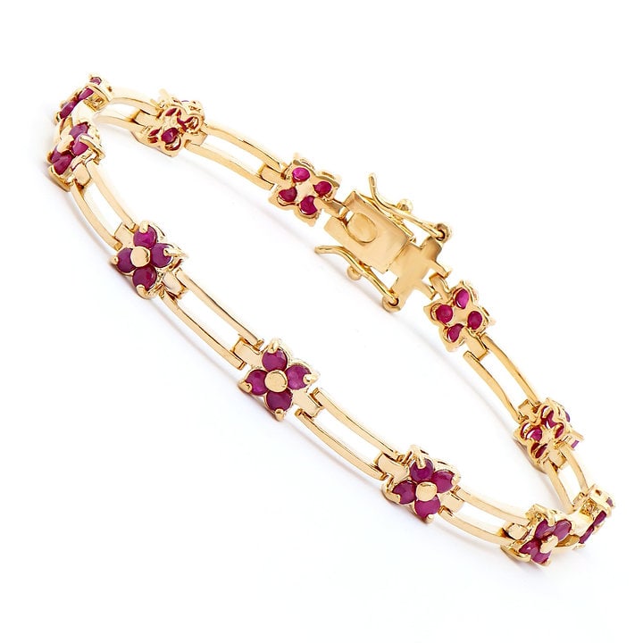 Plated 18KT Yellow Gold 4.25ctw Ruby Bracelet: One Plated 18KT Yellow Gold 4.25ctw Ruby Bracelet. (44) Rubies with a total weight of 4.25cts. Total weight of this bracelet is 8.79 grams. The length of this bracelet is 7 1/2 inches.