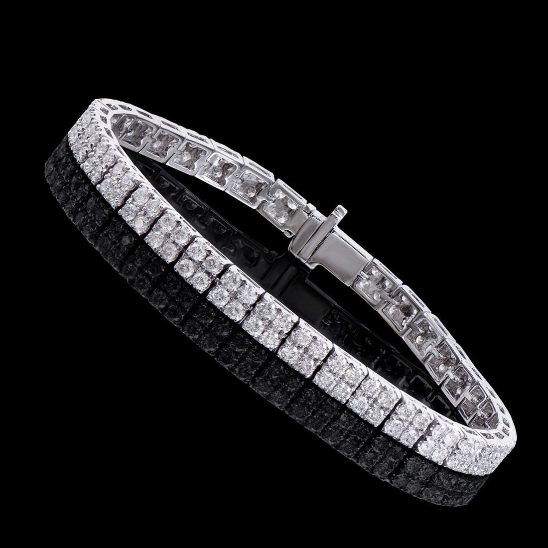 14KT White Gold 5.15ctw Diamond Bracelet: (148) round Diamonds with a total weight of 5.15cts with a color of H-I and clarity of I1-I2. Total weight of this bracelet is 13.20 grams. Length of this bracelet is 7.25 inches.