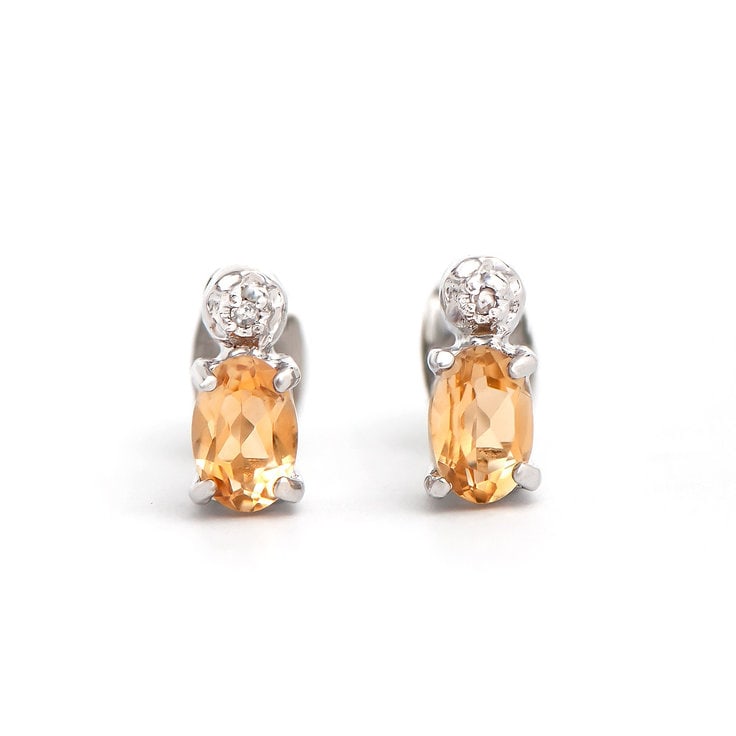 Plated Rhodium 0.82cts Citrine and Diamond Earrings: One pair of Plated 0.82cts Citrine And Diamonds Rhodium Earrings. (2) Orange Citrine stones with a total weight of 0.8cts. (2) diamonds with a total of 0.02cts with a color of H-I and clarity of I-3. 