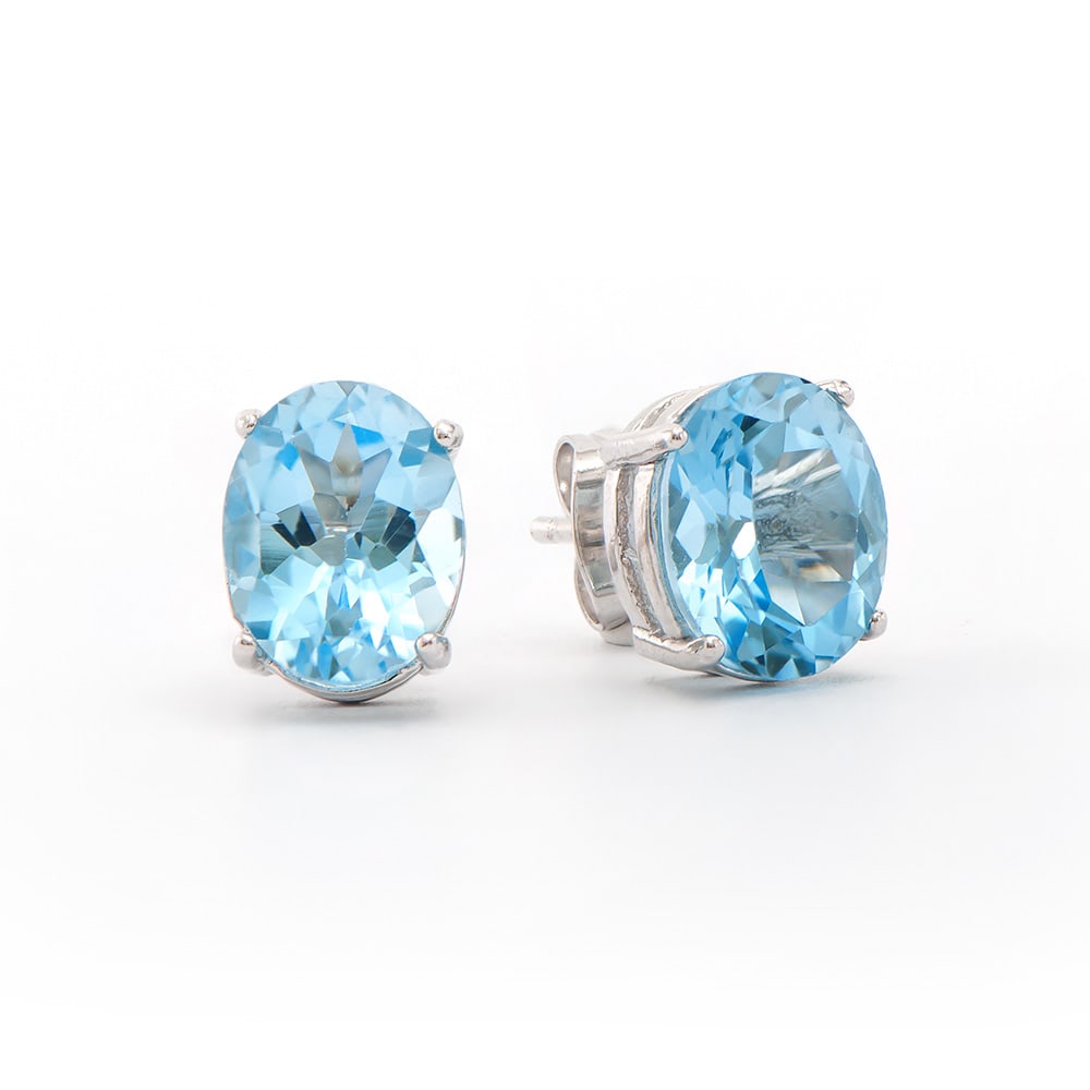 Plated Rhodium 5.65ctw Blue Topaz Earrings: One Plated Rhodium 5.65ctw Blue Topaz Earrings. (2) Blue Topaz stones with a total weight of 5.65cts. Total weight of these earrings are 2.55 grams.