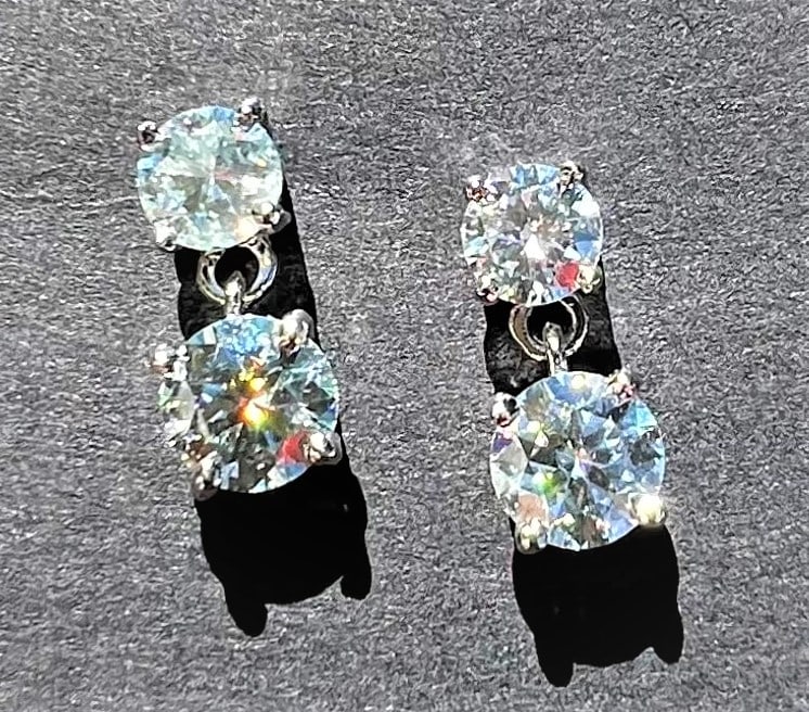 Sparkling 3.25cttw White E-F Fire Moissanite Drop Earrings: These 4 Investment Grade Moissanites Are VVs1 Eye Clean and approx. E-F in color. They are bursting out with a full spectrum of colors. These 4 Brilliant Round Cut Moissanites are mounted in 14 Kt Tri