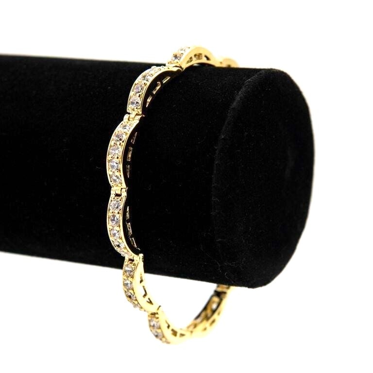 Dazzling 14 Kt 15.8 Grams Yellow Gold Plated Tennis Bracelet: Dazzling 7.25 Ct White VVs1 64 Stone Lab Simulated Diamond Tennis Bracelet. These Fine Gemstones Are Eye Clean Mounted In 14 Kt Yellow Gold Overlay. Approx. 7.0" Long. 15.8 Total Grams. Absolutely Stu