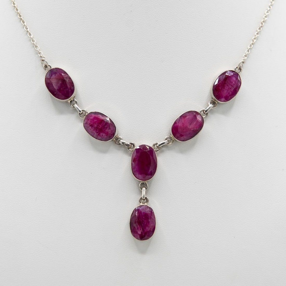 Natural 42 Ct Ruby Solid .925 Silver Necklace: Sterling Silver 42 Ct Natural Red Ruby Necklace. These Faceted Rubies Are Mounted In Solid .925 Sterling Silver. The Necklace Is Approx. 18" Long. Total Gram Wt. Is 17.6 Grams Or 85.5 Cttw.