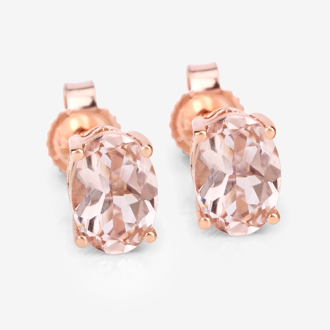 14KT Rose Gold 0.90ctw Morganite Earrings: Morganite Oval/6.50x4.50mm - 2/0.90 ctw Prong Setting Natural Irradiated E Total weight of 1.08 grams.