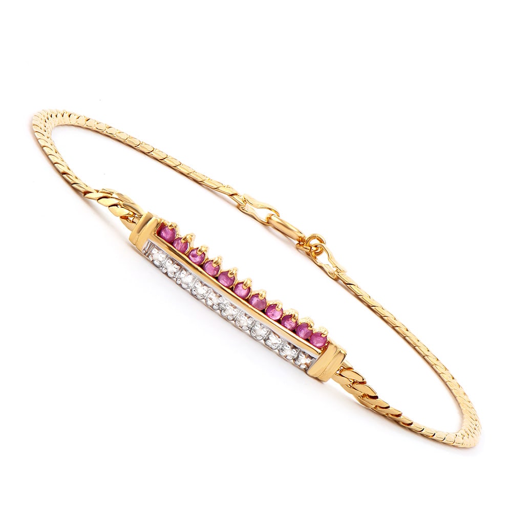 Plated 18KT Yellow Gold 0.51ctw Ruby and Diamond Bracelet: One Plated 18KT Yellow Gold 0.51ctw Ruby and Diamond Bracelet. 11 pieces of 2.1mm rubies. 11 pieces 1.1 mm round diamonds with a color of I-J and a clarity of I-3. Total weight of this bracelet is 4.5