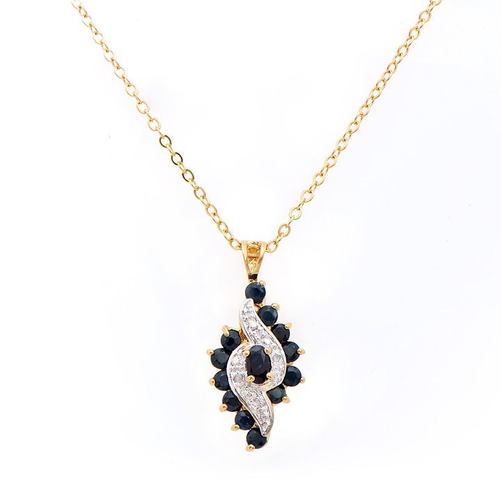 Plated 18KT Yellow Gold 1.50ctw Black Sapphire and Diamond Pendant with Chain: One Plated 18KT Yellow Gold 1.50ctw Black Sapphire and Diamond Pendant with Chain. (1) Black Sapphire with a total weight of 0.30cts.(12) Black Sapphires with a total weight of 1.20cts. Diamonds with 