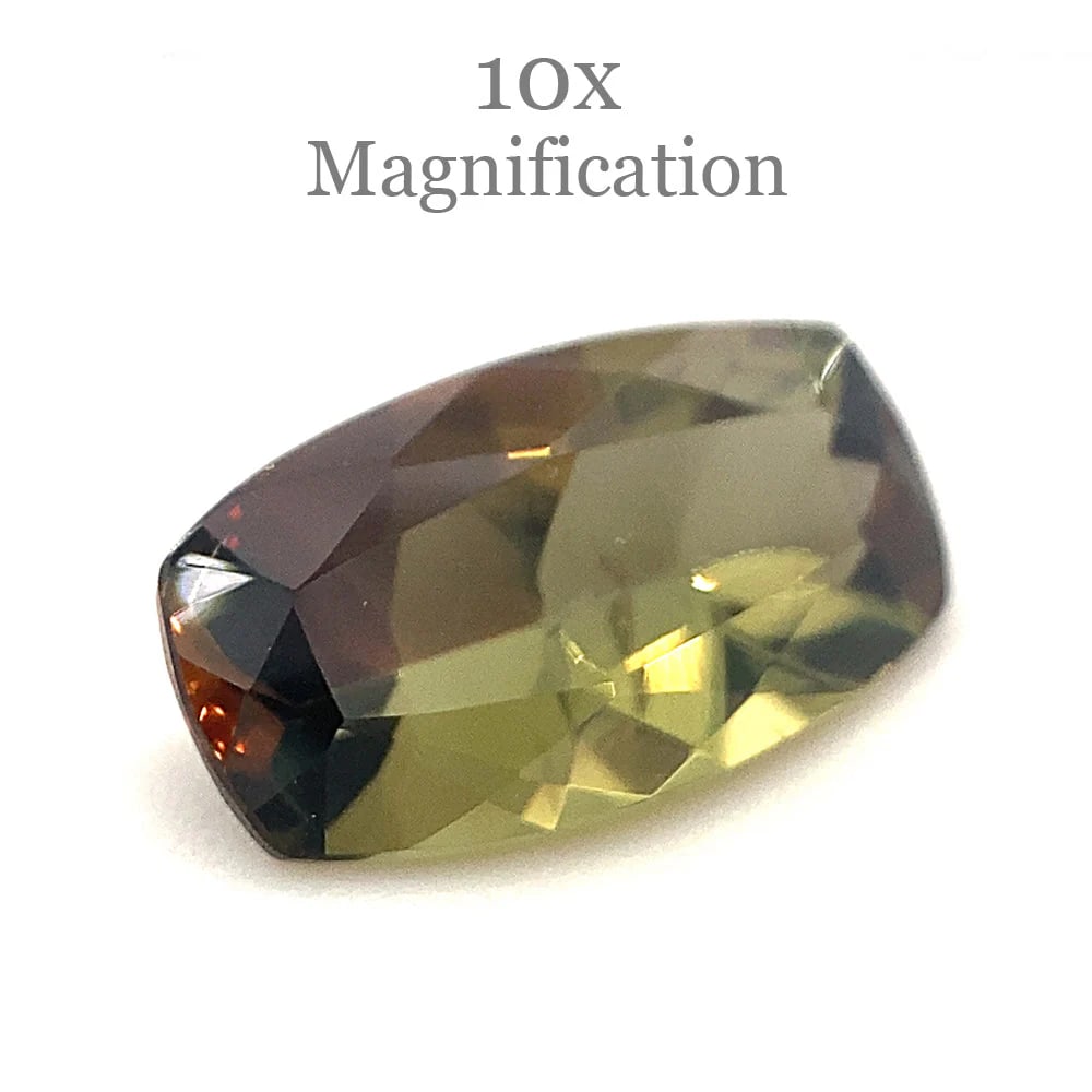 Pretty 1.54 Ct GIA Certified Natural Andalusite: Lovely 1.54 Ct Green-Yellow and Brownish Orange Andalusite is a cushion brilliant cut measuring 10.28 x 5.80 x 3.67 mm. Reveals a unique hue with a medium tone. Don't miss this one! Origin: Brazil. Tr