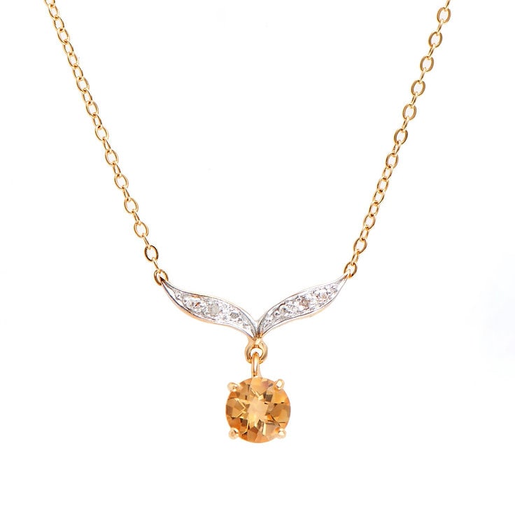 Plated 18KT Yellow Gold 1.04cts Citrine and Diamond Necklace: One Plated 18KT Yellow Gold 1.04cts Citrine and Diamonds Necklace 18 in. (1) Orange Citrine stones with a total weight of 1.02cts. (2) diamonds with a total of 0.02cts with a color of H-I and clarity 