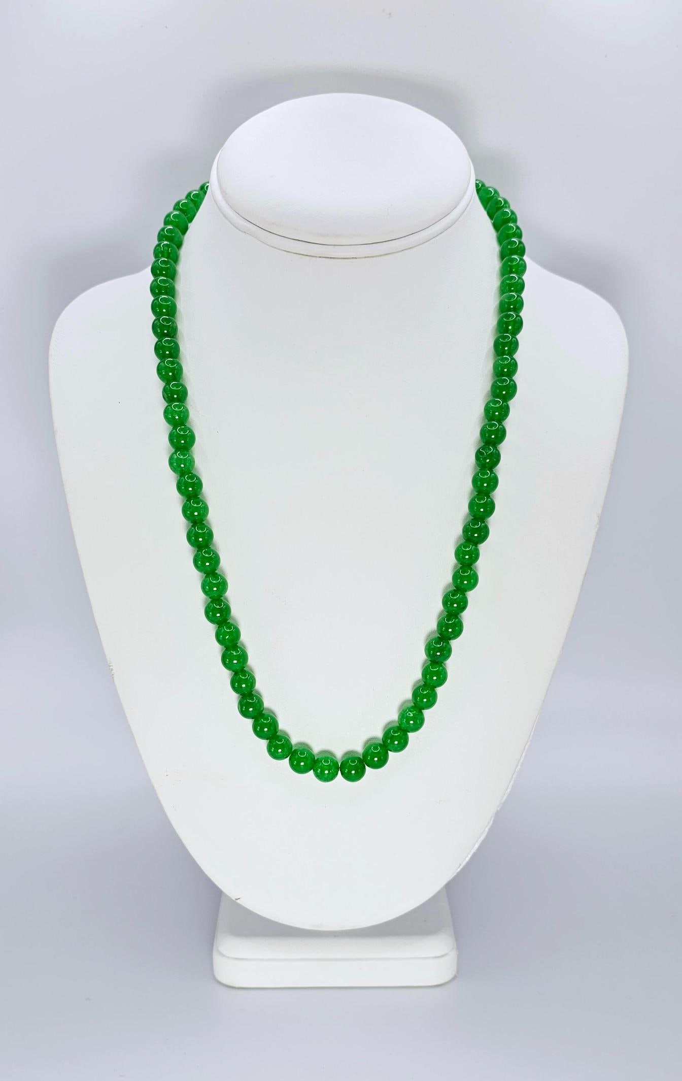 Beautiful 237 Ctw Natural Untreated Jade Necklace: Beautiful Rare 237 Cttw. Mined From The Earth Natural Jade Necklace. These fine polished beads are approx 8 mm. and are near perfect round. The neck size is adjustable from 16 to 20" to go with almost