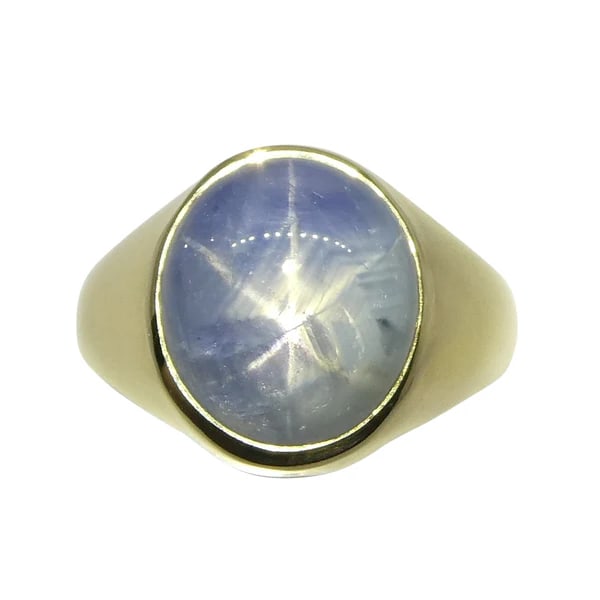 Beautiful 8.08 Ct Natural Blue Star Sapphire Ring: Rare Untreated 8.08 Ct Blue Star Sapphire is an oval cabochon cut measuring 12.31 x 11.04 x 5.52 mm. This lovely sapphire is set in 14k Yellow gold. This ring is incredibly gorgeous and would fit perf