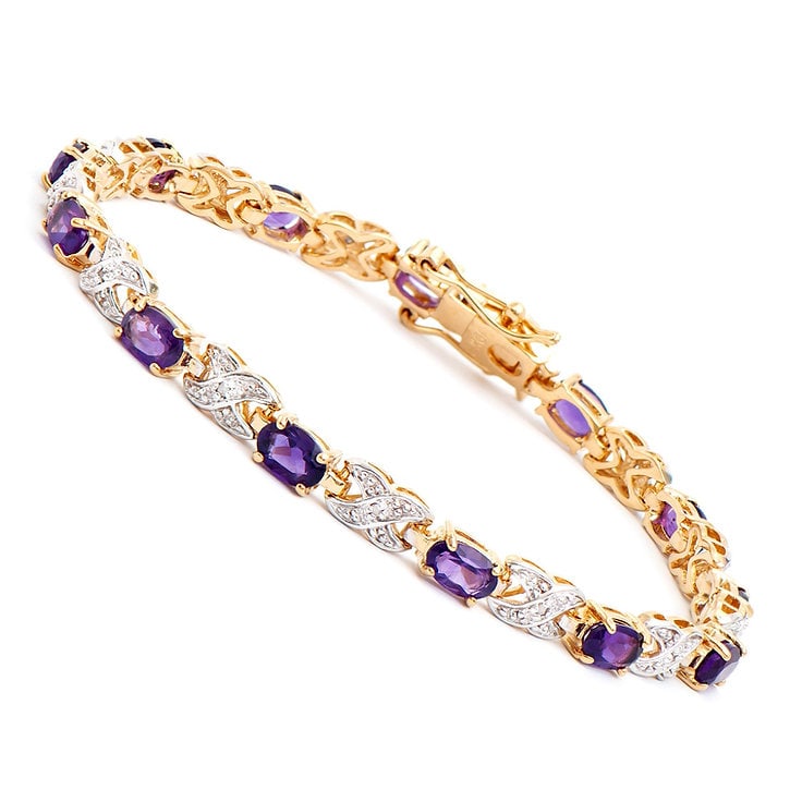 Plated 18KT Yellow Gold 5.31cts Amethyst and Diamond Bracelet: One Plated 18KT Yellow Gold 5.31cts Amethyst and Diamond Bracelet 7.5 in. (13) Violet Amethyst stones with a total weight of 5.2cts. (13) diamonds with a total of 0.11cts with a color of H-I and clari