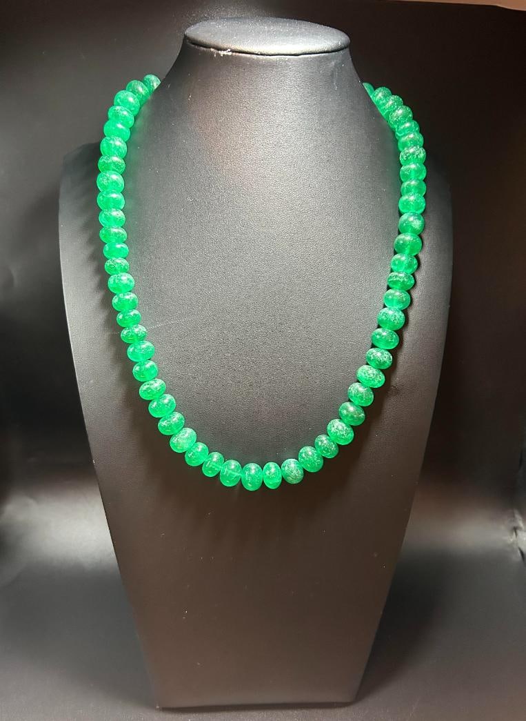 Huge 620.5 Cttw Natural Mined From The Earth Emerald Necklace: Beautiful Bright Emerald Green 631.5 Ctw Emerald Necklace.These mined from the earth natural emerald beads are approx 10 to 13 mm. in size. It measures approx 18-20" in length. Treated to enhance colo
