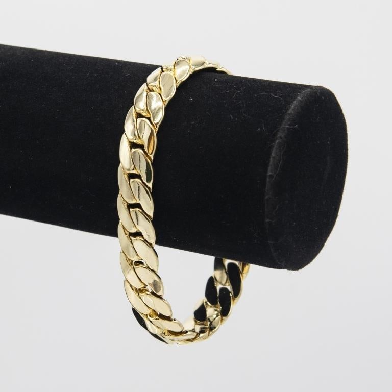 Huge 47.2 Gram 14 Kt Gold Plated Cuban Link Bracelet: Huge 47.5 Gram 14 Kt Tri-Layered Yellow Gold Plate Cuban Link Bracelet. A healthy 12 mm. thick. 9" long..***High Quality. Top Notch. Looks Like Solid Gold Without The Solid Gold Price. This Bracelet I