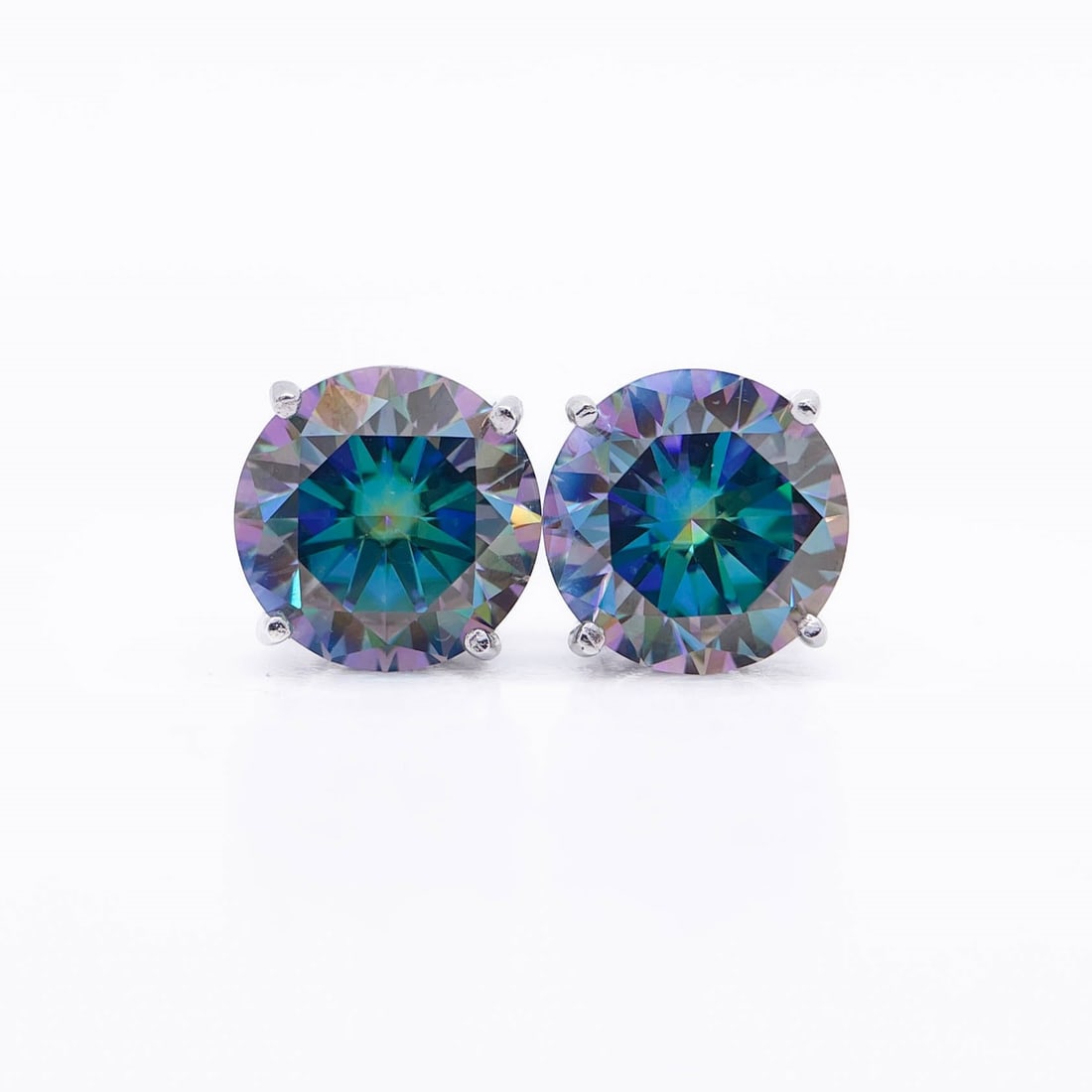 Plated 14KT White Gold 4.00ctw Russian Color Change Lab Simulated Alexandrite Earrings: This Pair of Russian 4 Ctw Lab Simulated Color Change Alexandrite's are both Eye-Clean Fine Brilliant Round Cuts Measuring 8mm. for a 4 Ct Total Gem Weight. The color spectrum ranges from beautiful gr