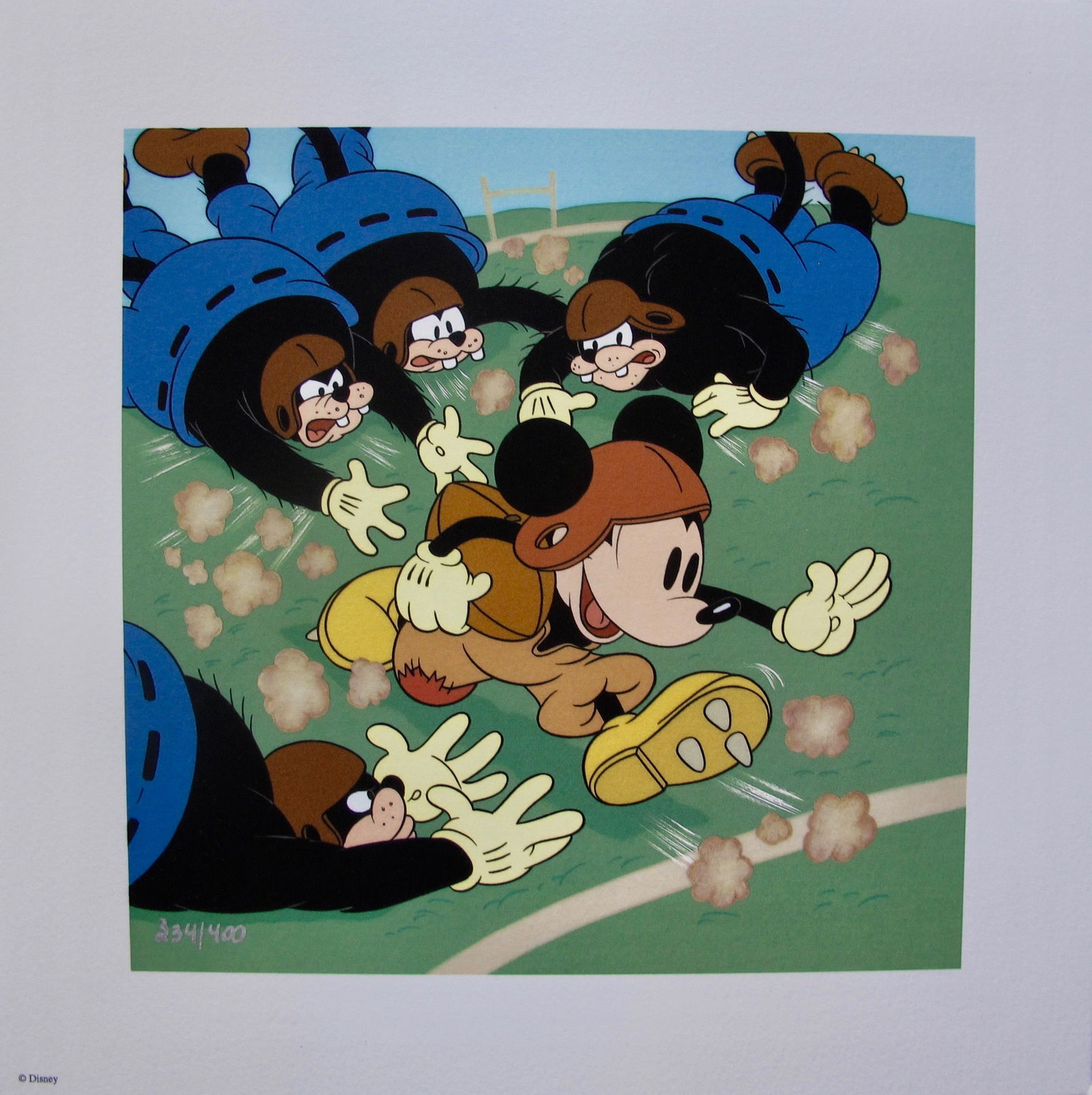 Walt Disney MICKEY MOUSE How to Play Football Animation Art Limited Edition Giclee: This is a Walt Disney Art Classics limited edition giclee featuring Mickey Mouse inspired by the 1944 animated short subject “How to play football” Published by Walt Disney Animation in 2000 a