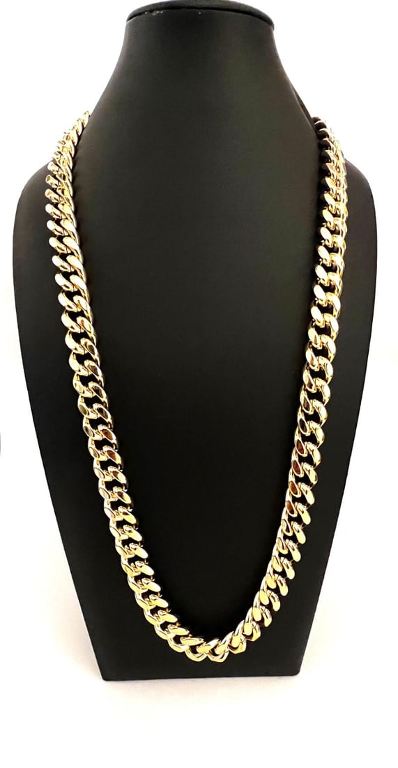 Huge 285.5 Gram 14 Kt Gold Plated Curb Link Necklace: Huge 285.5 Gram 14 Kt Gold Plated Cuban Curb Link Necklace. This High-Quality Top Notch Necklace Is Stealth Measuring A Healthy 14 mm Wide and Secured with a Double Safety Clasp. It measures 30 inches