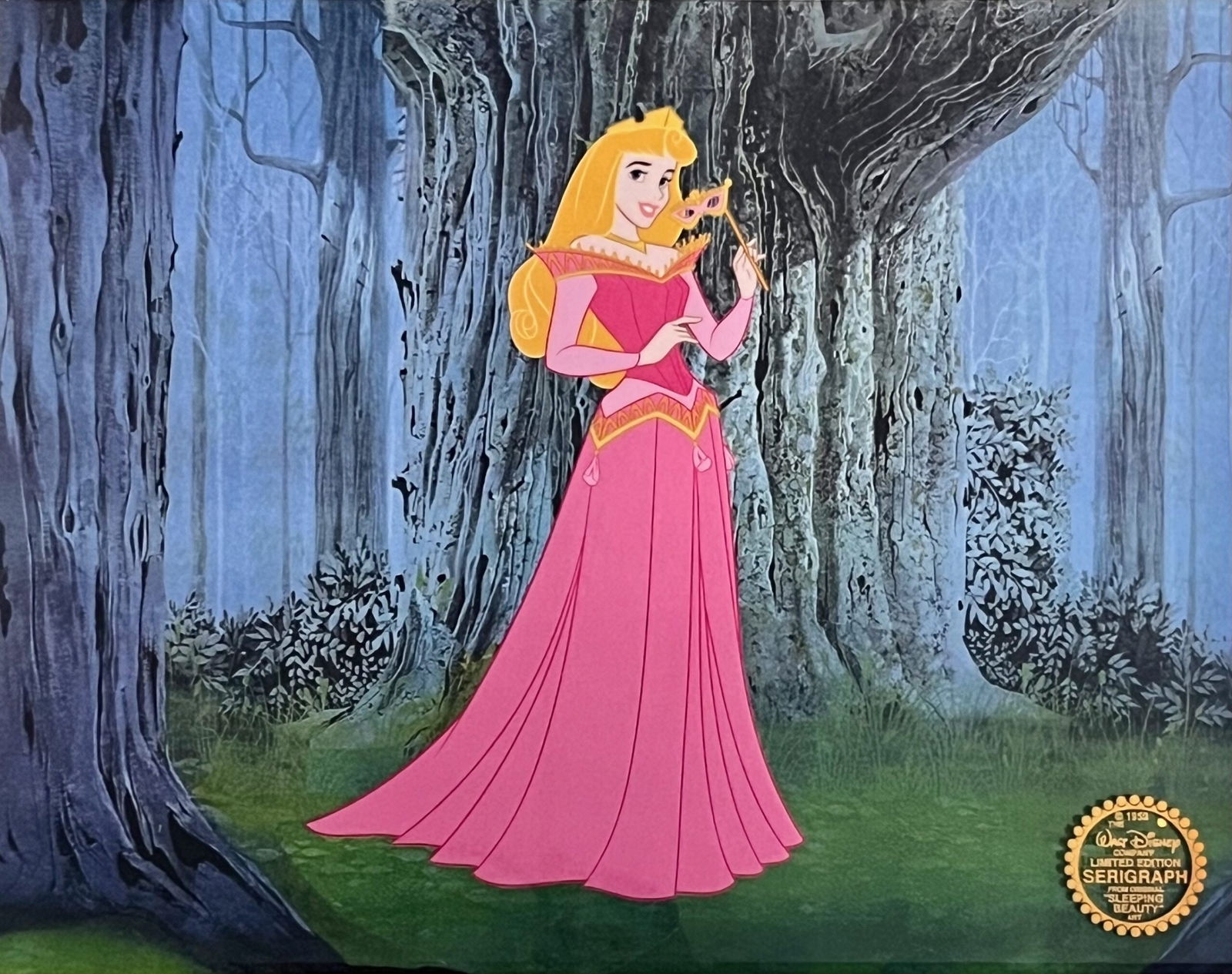 DISNEY SLEEPING BEAUTY AURORA Sericel Animation Art Serigraph Cel: This is a Disney Limited Edition Serigraph Cel of Aurora from the WALT DISNEY 1959 Classic Animation “Sleeping Beauty”. Disney’s own artists have selected this scene from the original animat