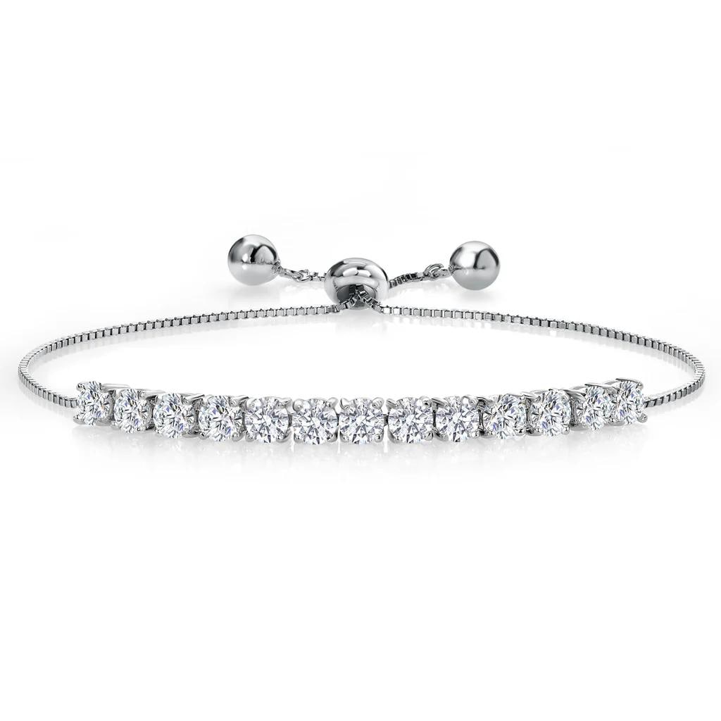 Plated Rhodium 2.99ctw Moissanite Bracelet: 13 Moissanite round stones with a total weight of 2.99cts. Each stone is 0.23cts with a near flawless color measuring 4x4mm. Fully adjustable up to 9 inches.