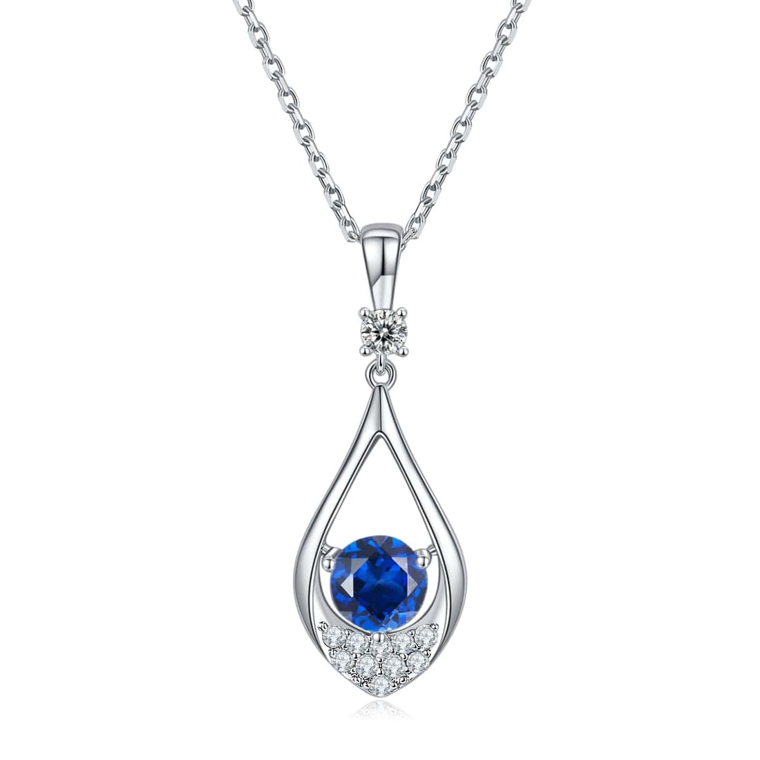 Dazzling Blue Sapphire Lab Created Pendant: Ladies Lab Created Sri Lanka Blue Sapphire Pendant. This Blue Sapphire Pendant is a near flawless 1 ct brilliant round cut. Mounted in .925 solid sterling silver. It is complimented by 14 Kt White Gol