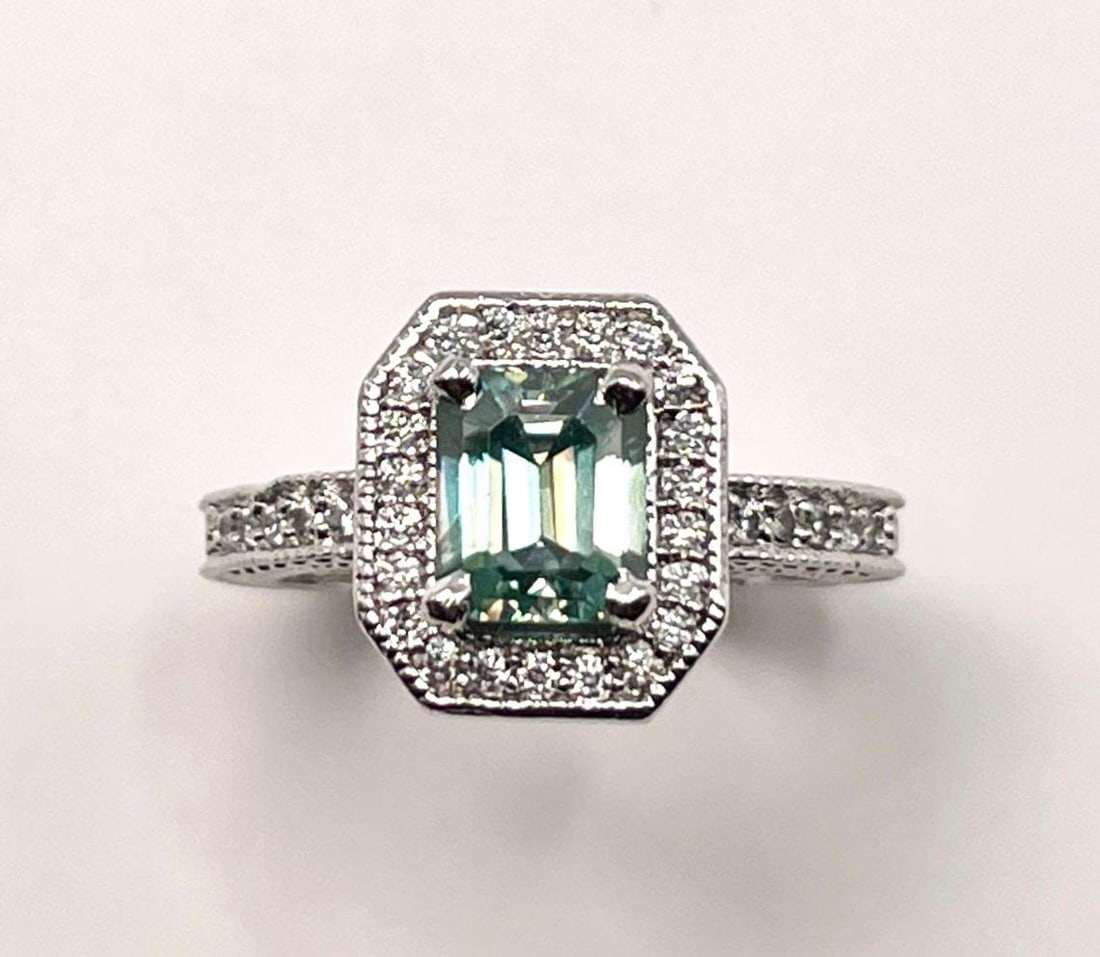 14KT White Gold Plated 2.35 Ct Lab Simulated Paraiba Tourmaline Ring: 14 Kt White Gold Plated 2.35 Ct Lab Simulated Paraiba Tourmaline Ring. Impressive Rare 2.35 Ct Lab Simulated Paraiba Diamond Ring. This Mesmerizing Blue Green Center-Stone is an Eye Clean Emerald Cut