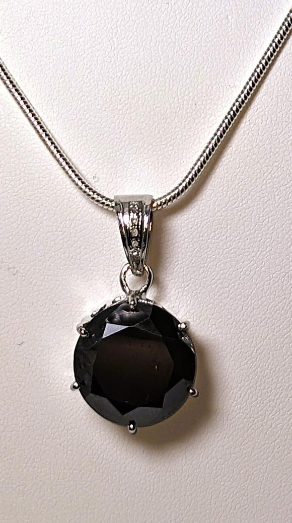 Huge Rare 19.5 Ct Lab Simulated Black Diamond 14 K Gold Plate Pendant: This Huge Rare 19.5 Ct Black Lab Simulated Diamond Round Brilliant Round Cut Measuring 17.5 mm. It Is Mounted In14 Kt White Gold over Solid .925 Sterling Silver which gives this pendant its high polis