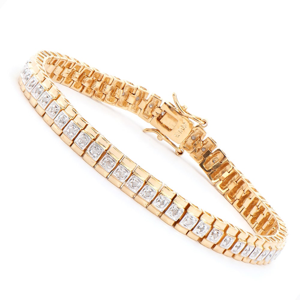 Plated 18KT Yellow Gold 0.58ctw Diamond Bracelet: One Plated 18KT Yellow Gold 0.58ctw Diamond Bracelet. (58) Diamonds with a total weight of 0.58cts with a color of I-J and clarity of I-3. Total weight of 14.75 grams of brass layered with 18K yellow