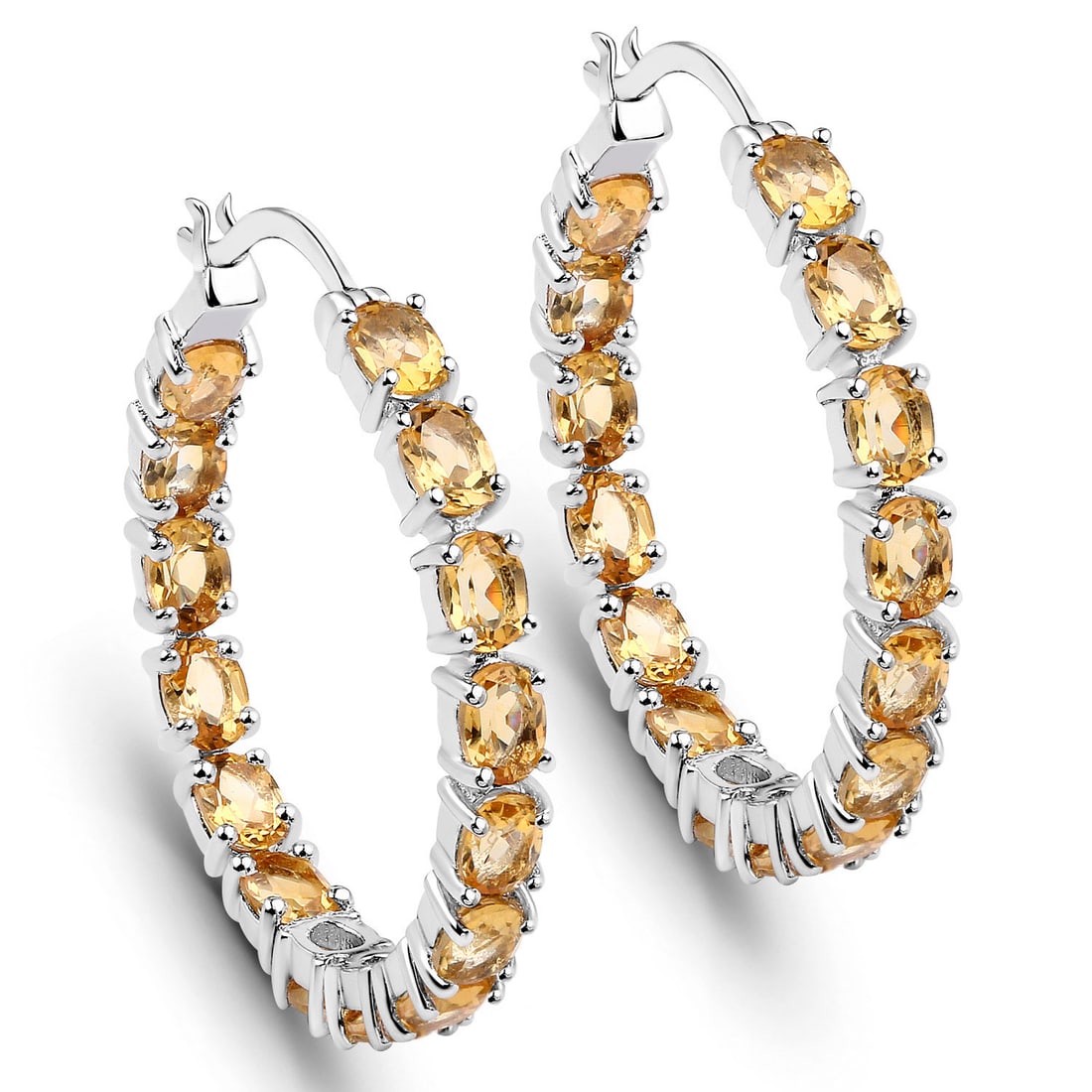 Plated Rhodium 4.80ctw Citrine Earrings: 4.80 Carat Genuine Citrine.925 Sterling Silver Earrings. Citrine Oval/4x3mm - 30/4.80 ctw Prong Setting Natural Heat Treated N. Total weight 5.96 grams.